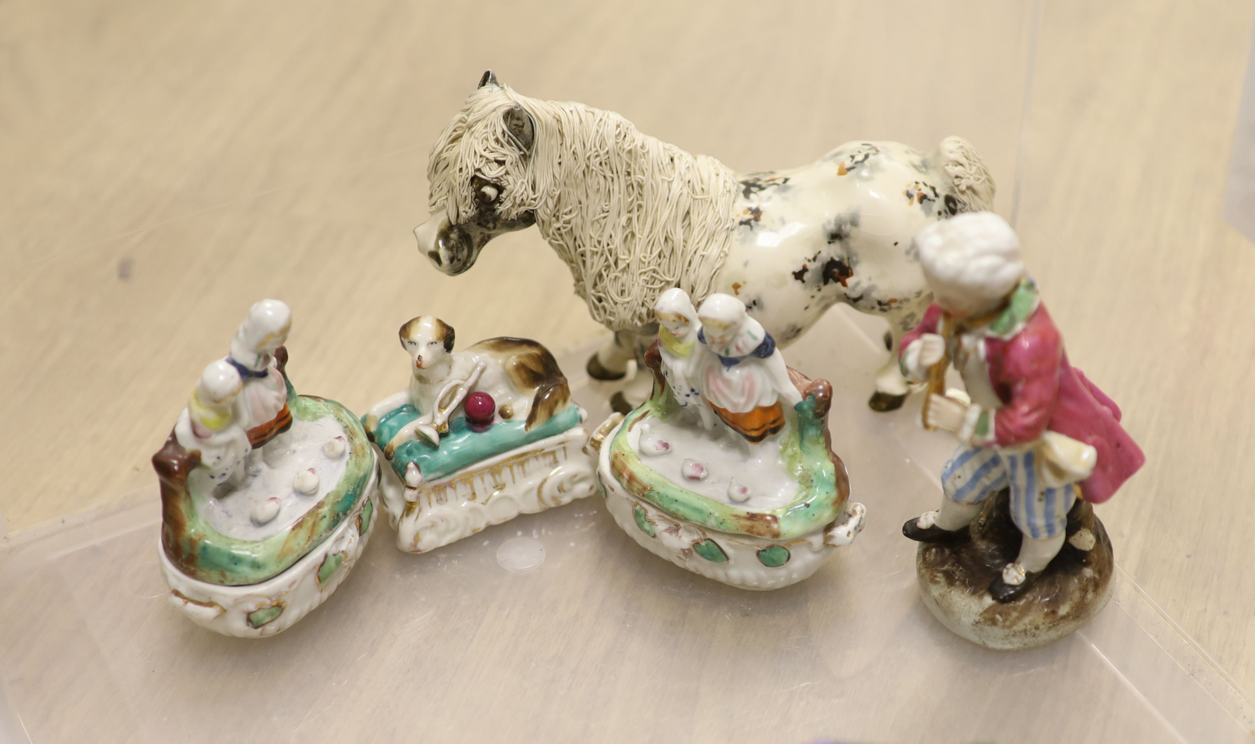 A group of ornate glass and ceramic figurines, 19th/20th century